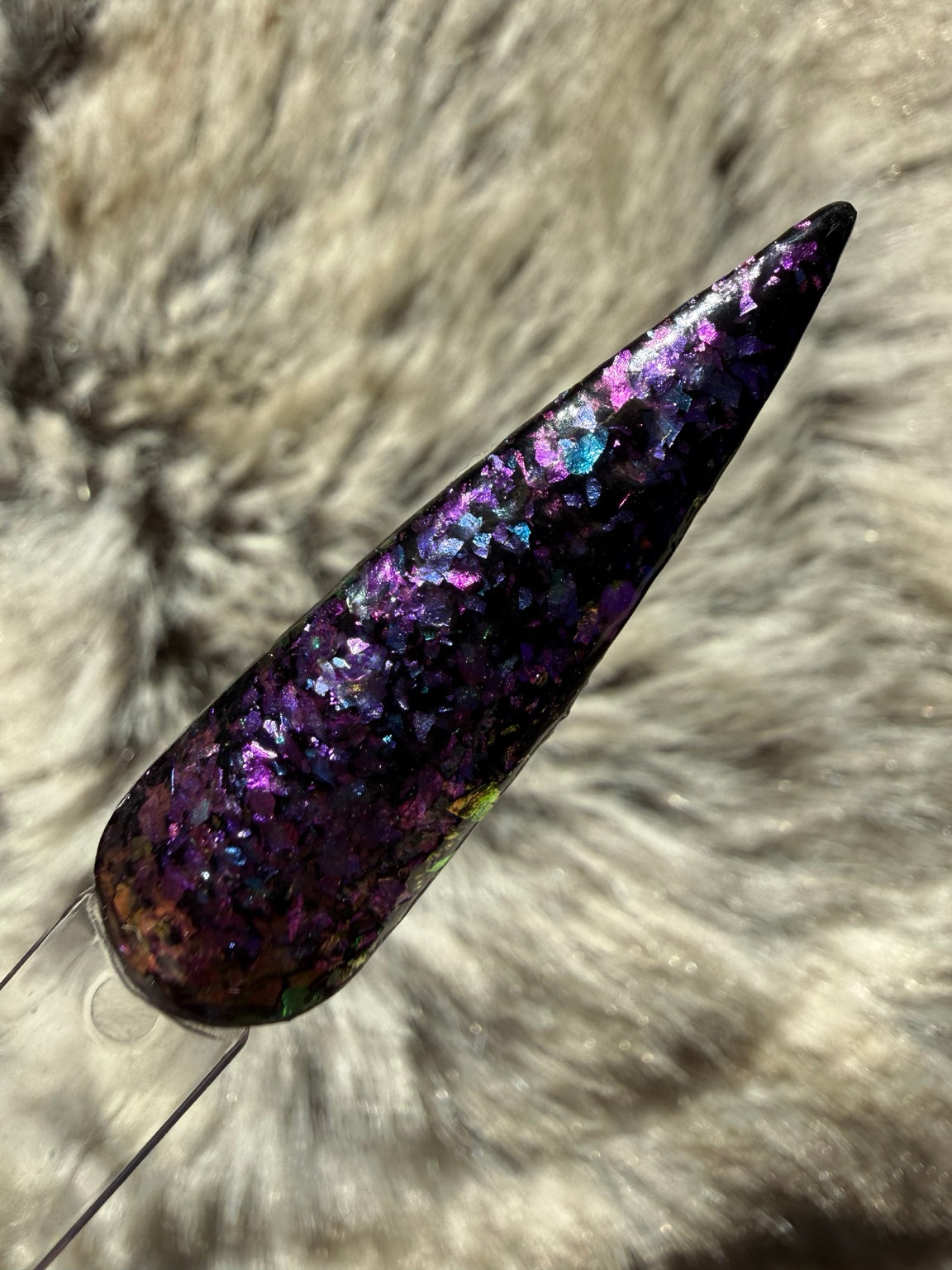 No Chill black dip powder with purple pink and icy blue flakes