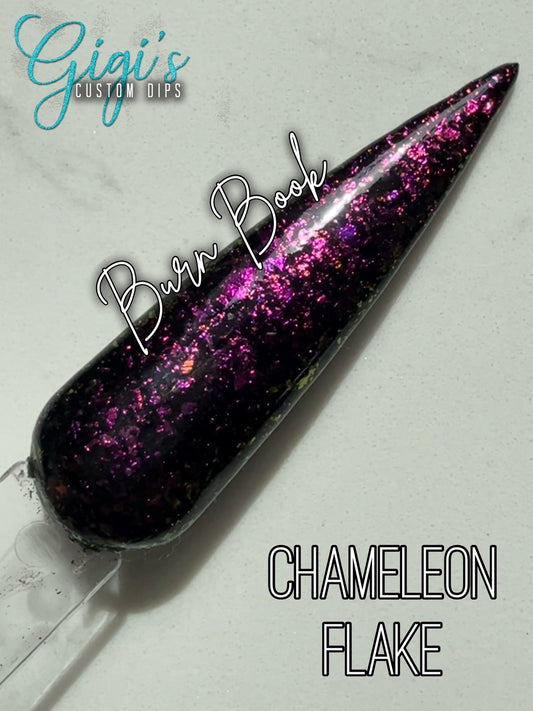 Burn Book black dip powder with hot pink and fuchsia through rich violet and purple chameleon flakes