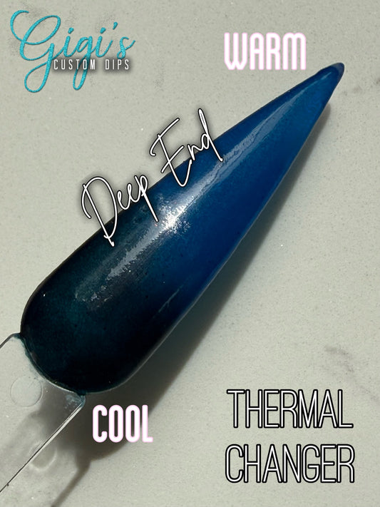 Labeled Deep End thermal dip powder swatch showing cool deep teal navy and warm bright ocean blue