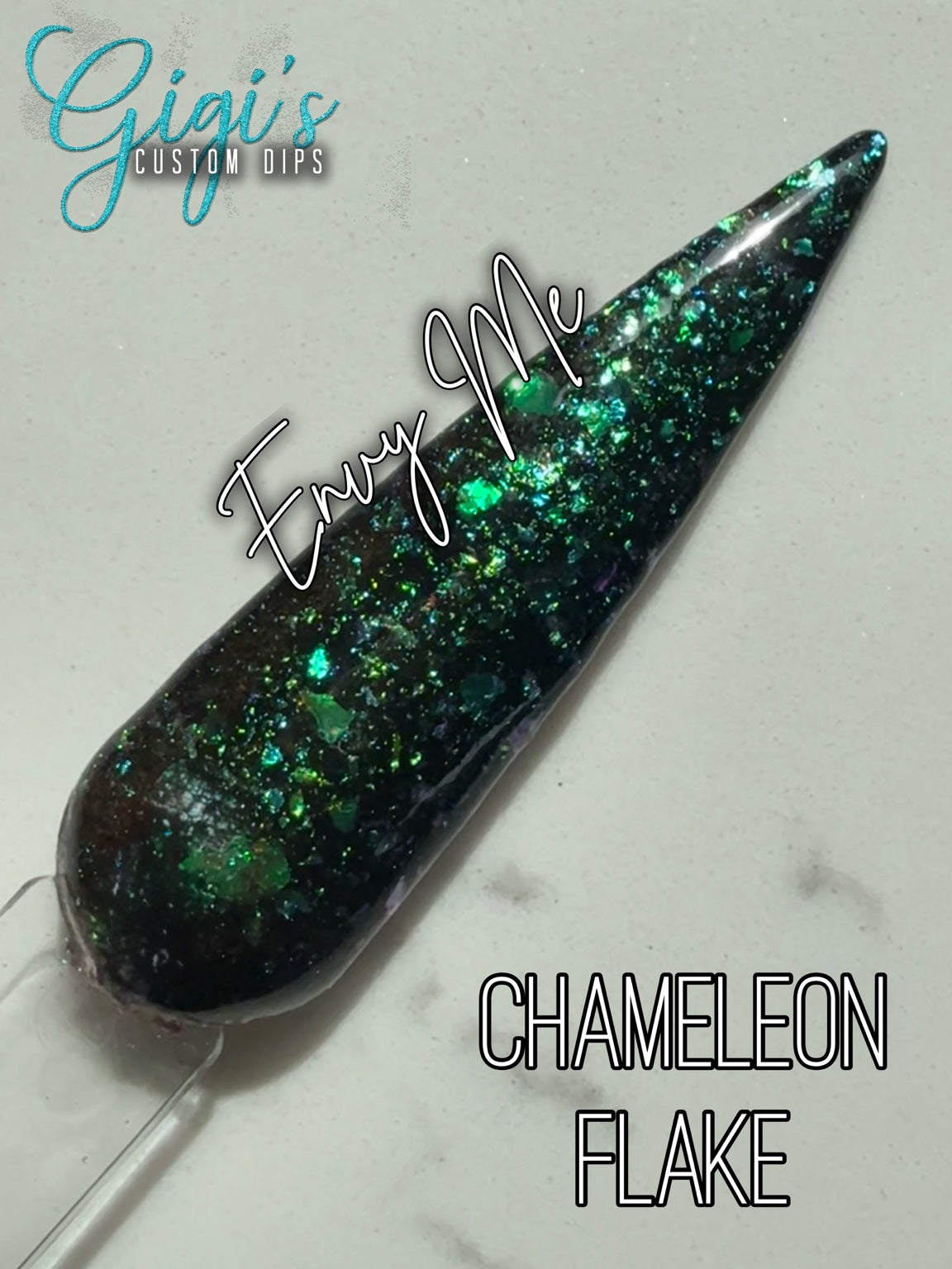 Envy Me black dip powder with emerald green through teal and blue, with subtle golden flashes chameleon flakes