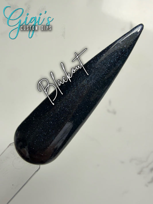Blackout black with a fine shimmer dip powder swatch